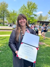 Tara Rawlings photo with her diploma.